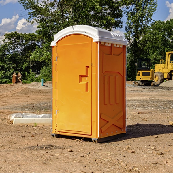 how often are the portable restrooms cleaned and serviced during a rental period in Benton